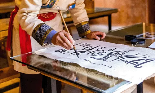 Traditional Dongba script writing in Lijiang Old Town